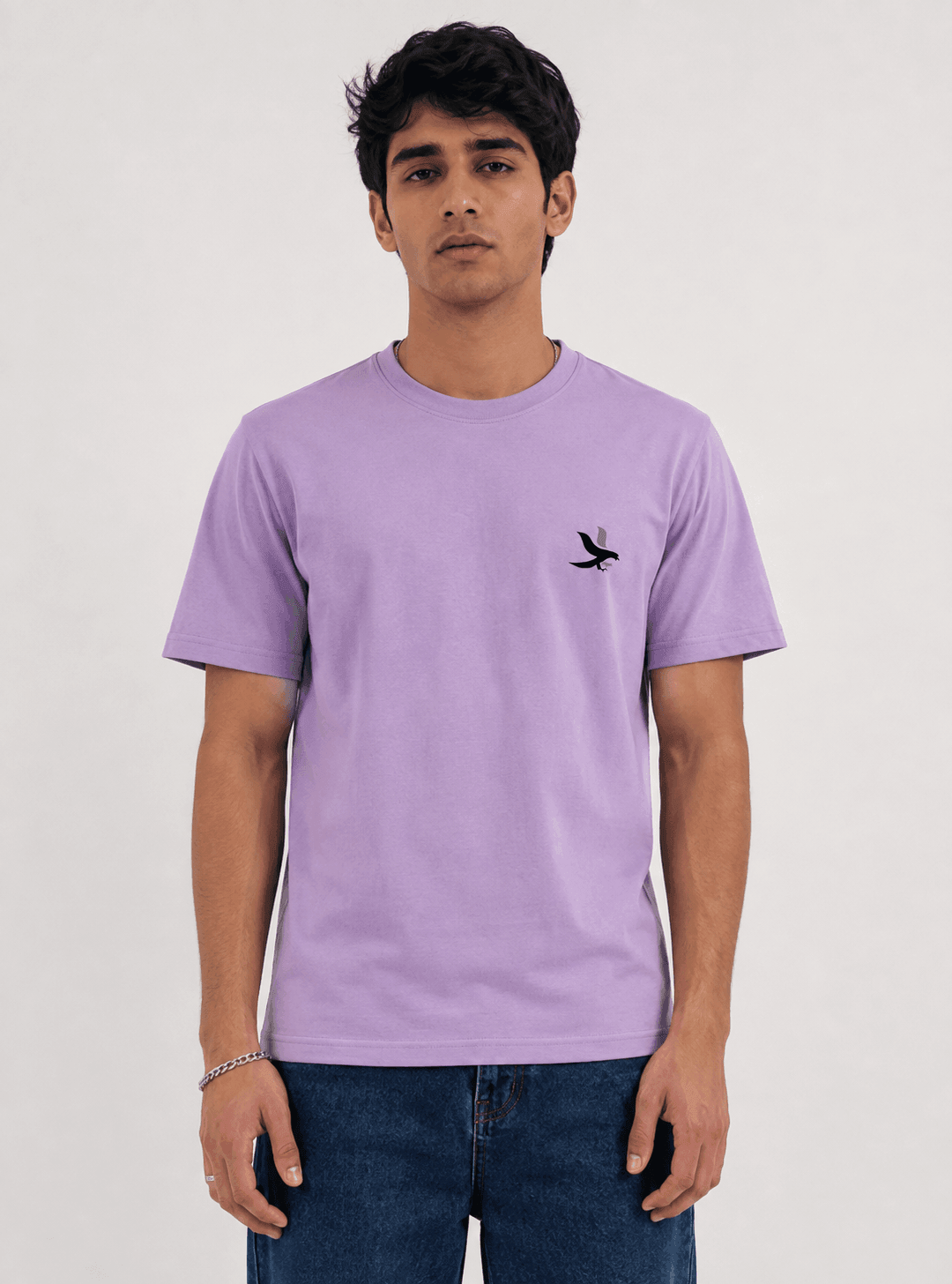 Model wearing the Lavender Signature Eagle regular-fit T-shirt, front view with the eagle chest mark