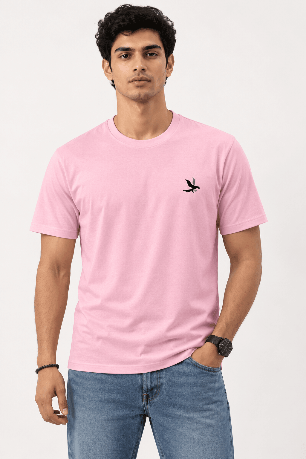 Model wearing the Light Pink Signature Eagle regular-fit T-shirt, front view with the eagle chest mark