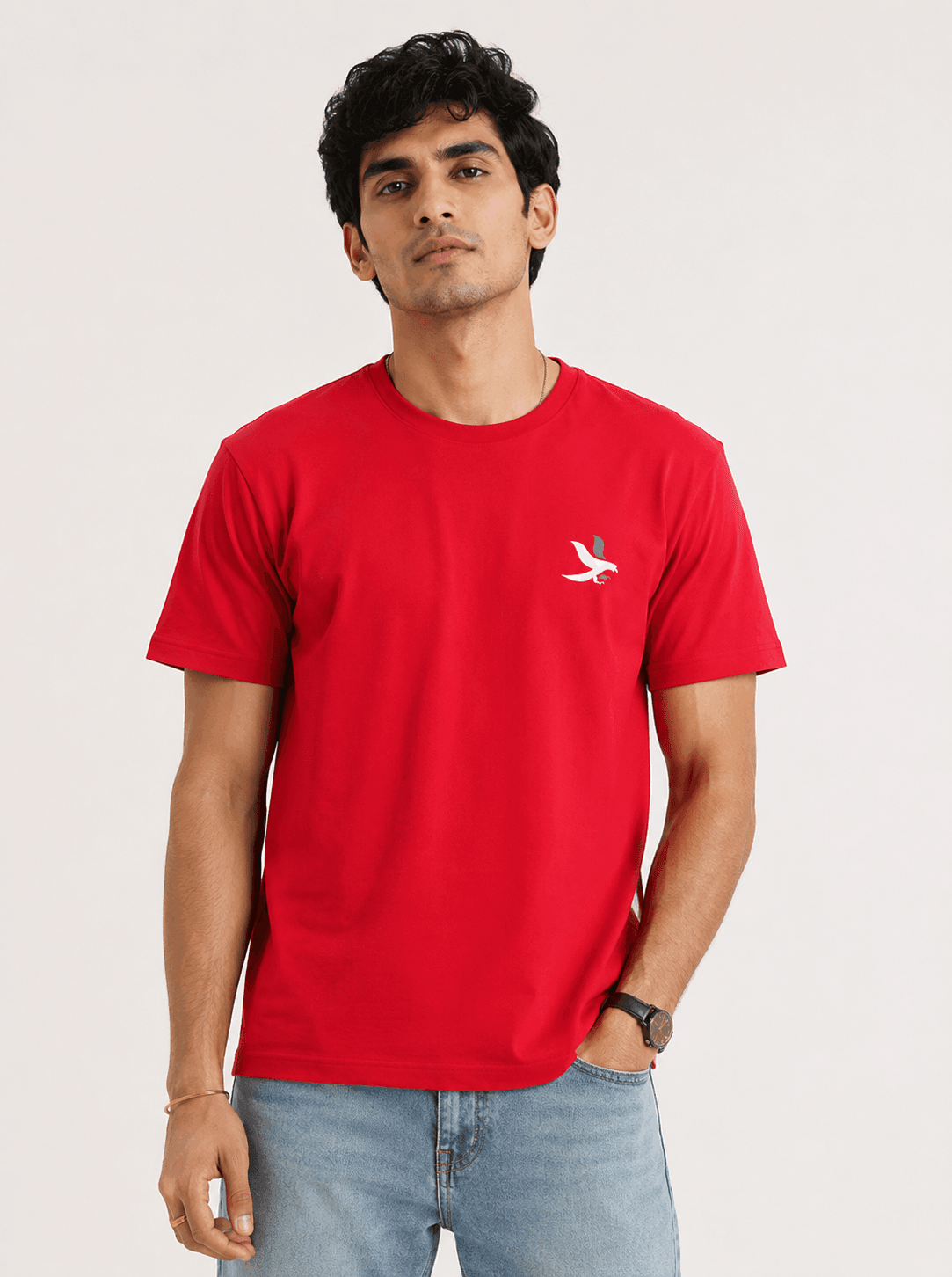 Model wearing the Red Signature Eagle regular-fit T-shirt, front view with the eagle chest mark